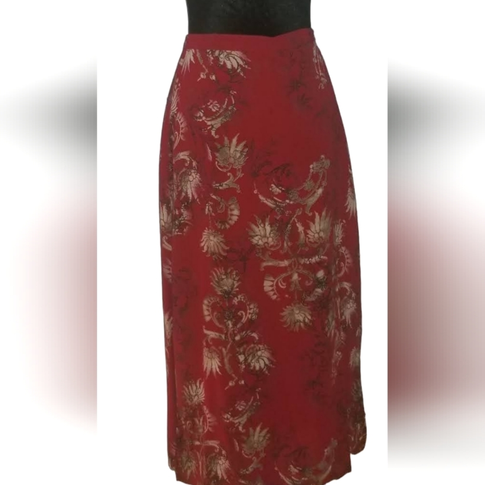 NU INFLUENCE midi skirt with oriental flare.
